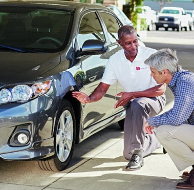 Service technician talking with customer.